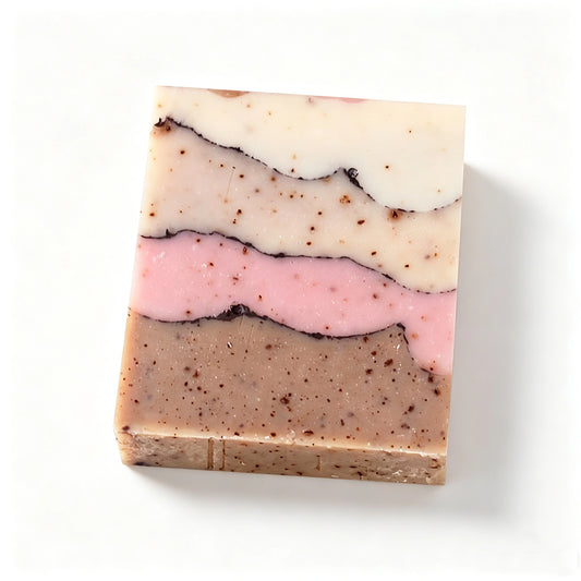 This handmade cold‑process facial soap features beautiful layered pastel tones, blending soft white, beige, pink and earthy brown hues. Infused with gardenia fragrance, it gently cleanses skin while retaining natural moisture. Crafted with fine natural particles, it delivers a mild exfoliating experience for daily facial care.