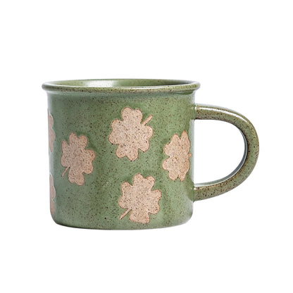 This vintage rough‑ceramic coffee mug comes in two styles, featuring a muted green speckled glaze full of rustic charm. One version is decorated with delicate four‑leaf clover patterns, while the other adopts a two‑tone color‑block design. It is ideal for enjoying coffee, tea, and daily hot drinks.