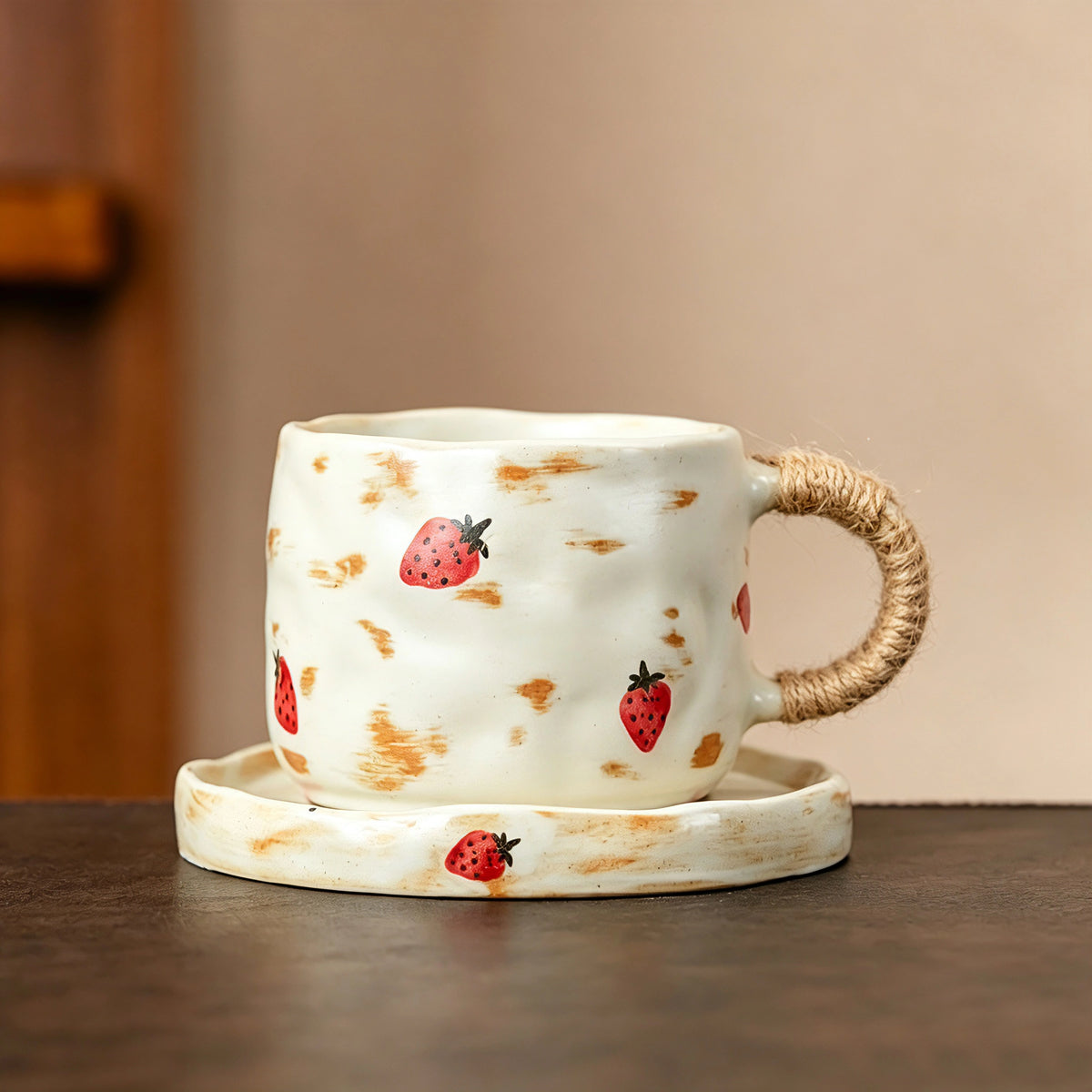 These vintage kiln‑change ceramic mugs feature unique dripping glaze rims and textured hand‑thrown bodies. The handles are wrapped with natural jute rope, adding a rustic artisanal touch. Available in multiple charming colorways, they make lovely daily coffee and tea drinking sets.