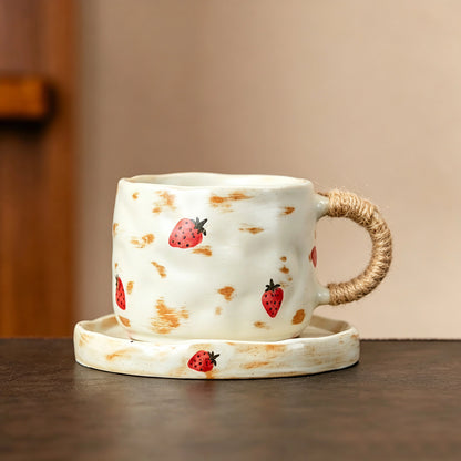 These vintage kiln‑change ceramic mugs feature unique dripping glaze rims and textured hand‑thrown bodies. The handles are wrapped with natural jute rope, adding a rustic artisanal touch. Available in multiple charming colorways, they make lovely daily coffee and tea drinking sets.